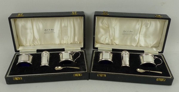 A pair of three piece condiment sets with mustard spoons, salt spoons lacking, Birmingham 1962,