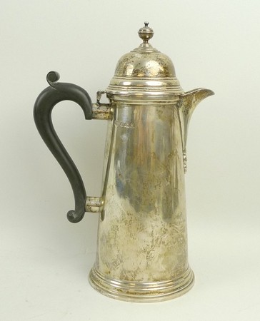 A silver coffee pot of cylindrical outswept form, the hinged lid with ball finial, Birmingham