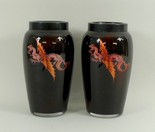 A pair of Stourbridge, DG ware cased glass canisters, lids lacking, decorated with dragons, 18cm