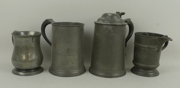 A group of pewter tankards, one with lid. (4)