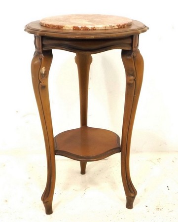 A 20th century plant stand, with circular marble inset top, 47 by 78cm high.