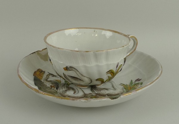 A Meissen porcelain tea cup and saucer, late 19th century, modelled after Kaendler and Eberlein as a