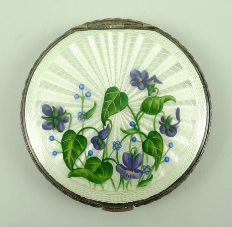 A silver compact, Joseph Gloucester Ltd, Birmingham 1951, the guilloche enamelled lid decorated with