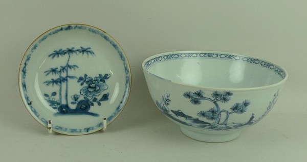 A Nanking Cargo porcelain slop bowl, 15 by 7cm, and saucer, 12 by 2cm, both with certificates,