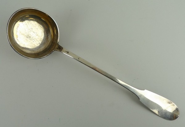 A Continental white metal punch ladle, late 19th century, monogram engraved, 6.89toz, 37cm long.