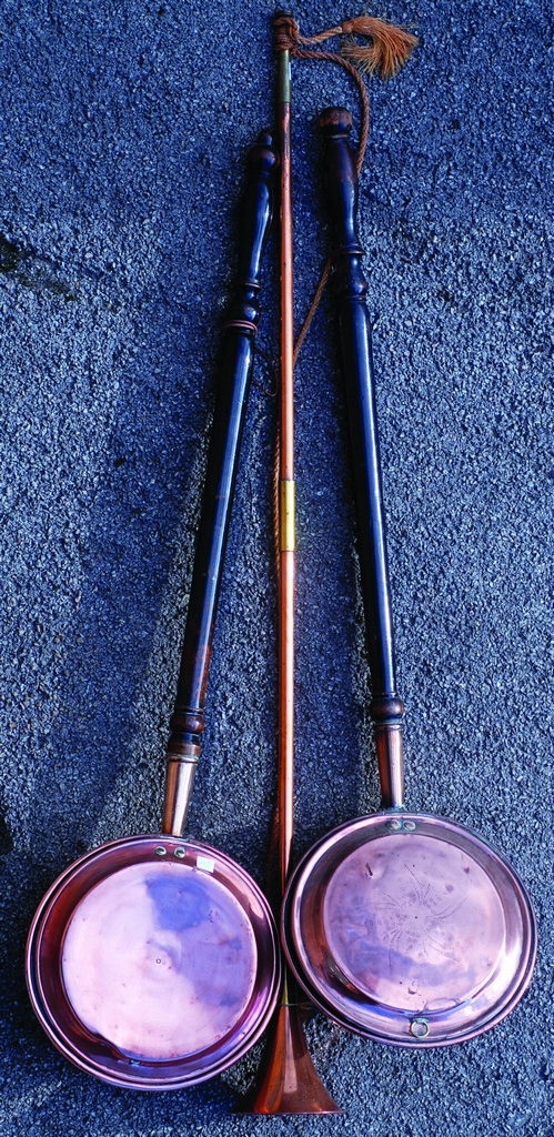 2 COPPER BED PANS. 3ft 4ins long, both with wooden handles & copper pans with engraving. Plus