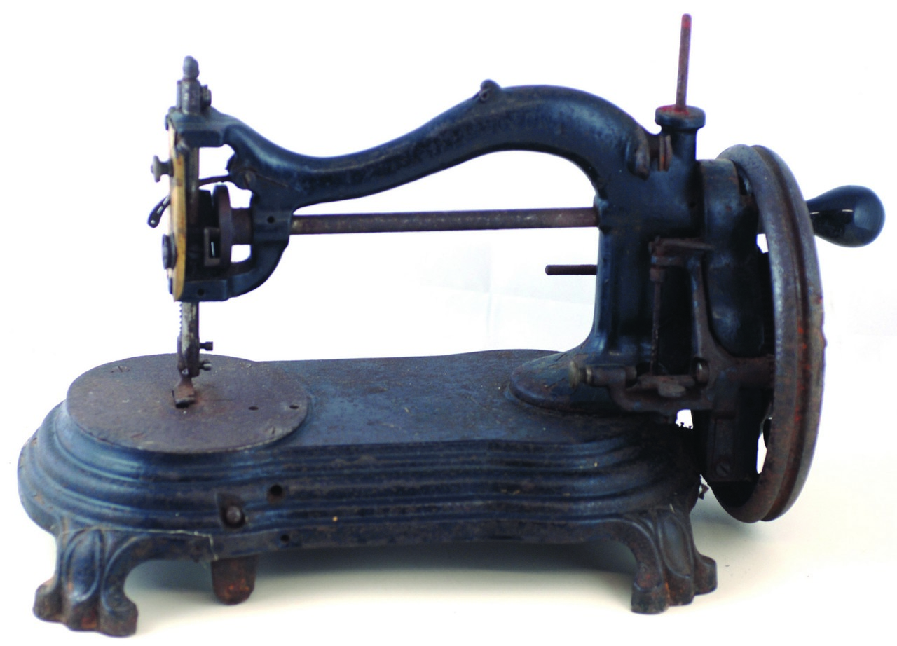 CAST IRON SEWING MACHINE. 10ins tall, cast iron sewing machine on paw feet ?PATENT LOCK STITCH HAND