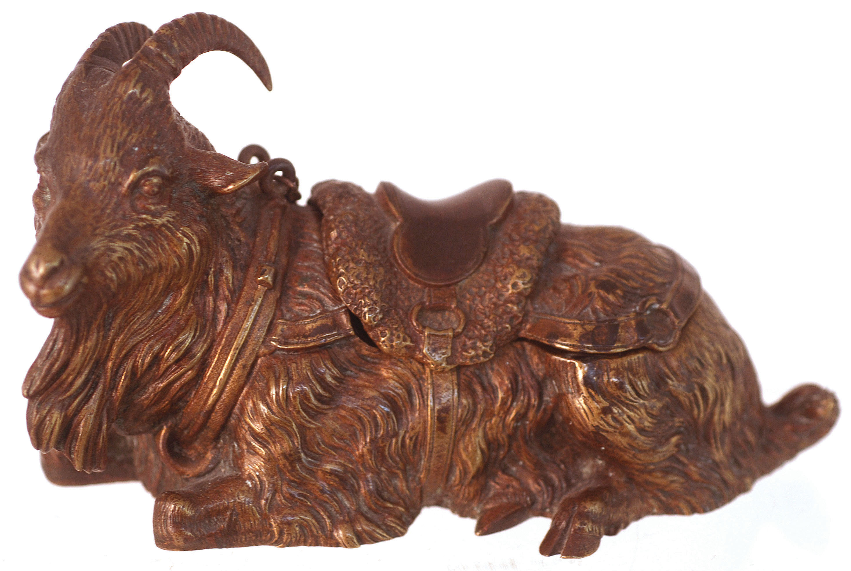 GOAT INKWELL. 3.25ins tall, 5.75ins long, heavy brass/ bronze inkwell in shape of a goat, saddle