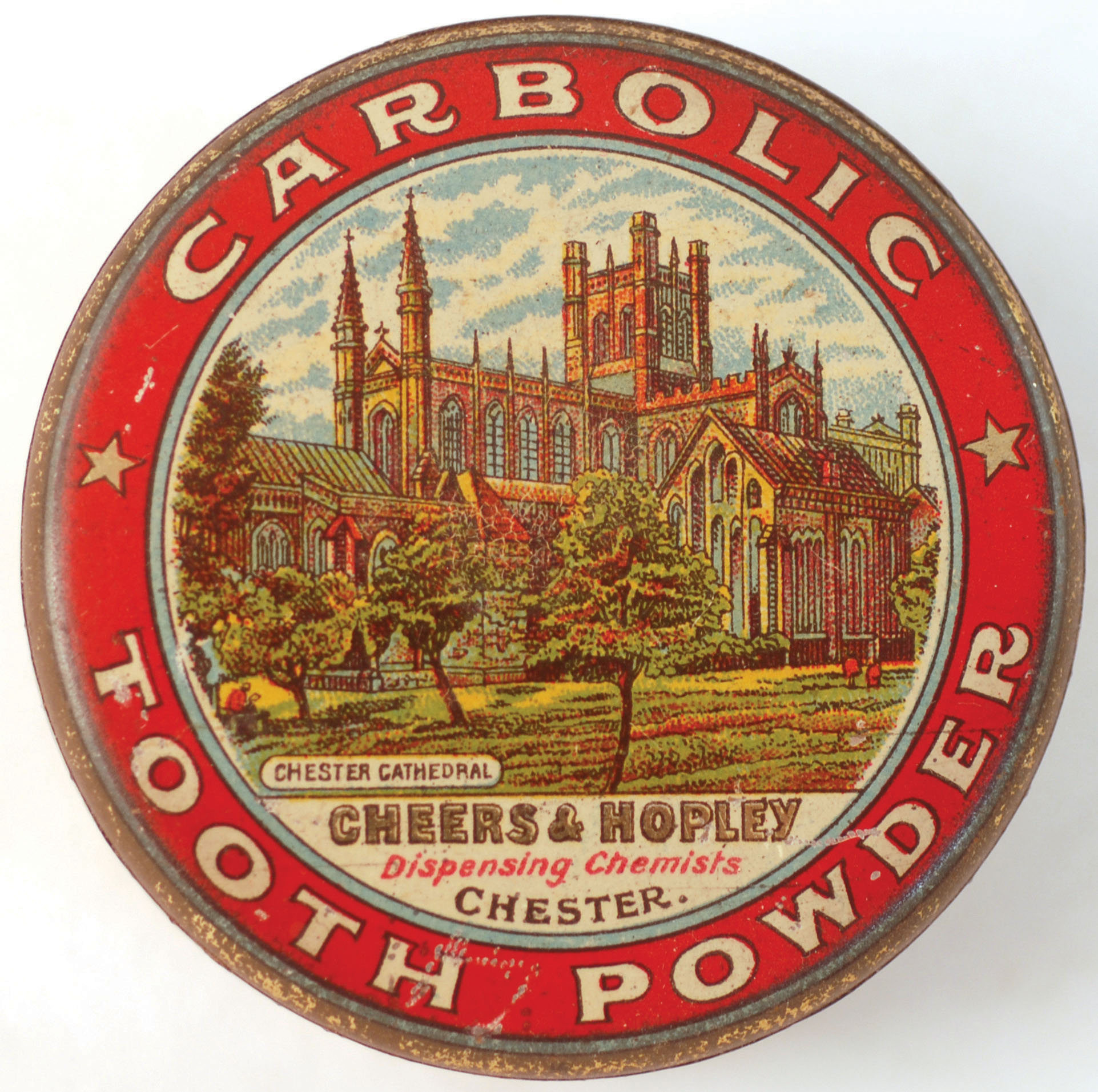 CARBOLIC TOOTH POWDER TIN. 2.25ins diam, full/ sealed tin, coloured lid showing Chester Cathedral ‘