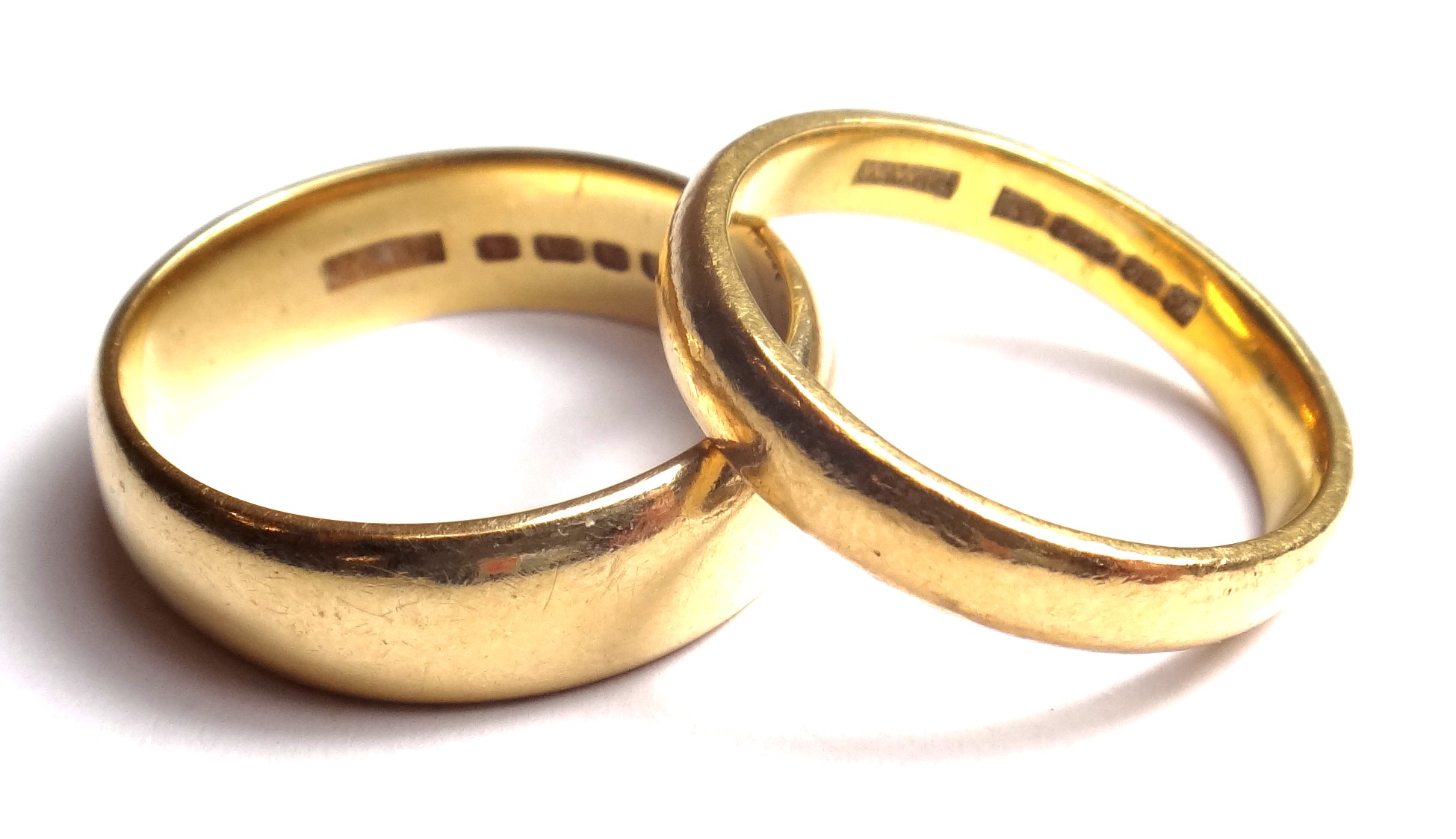 A 22ct gold plain wedding ring, ring size U, weight 7 gms and an 18ct gold plain wedding ring,