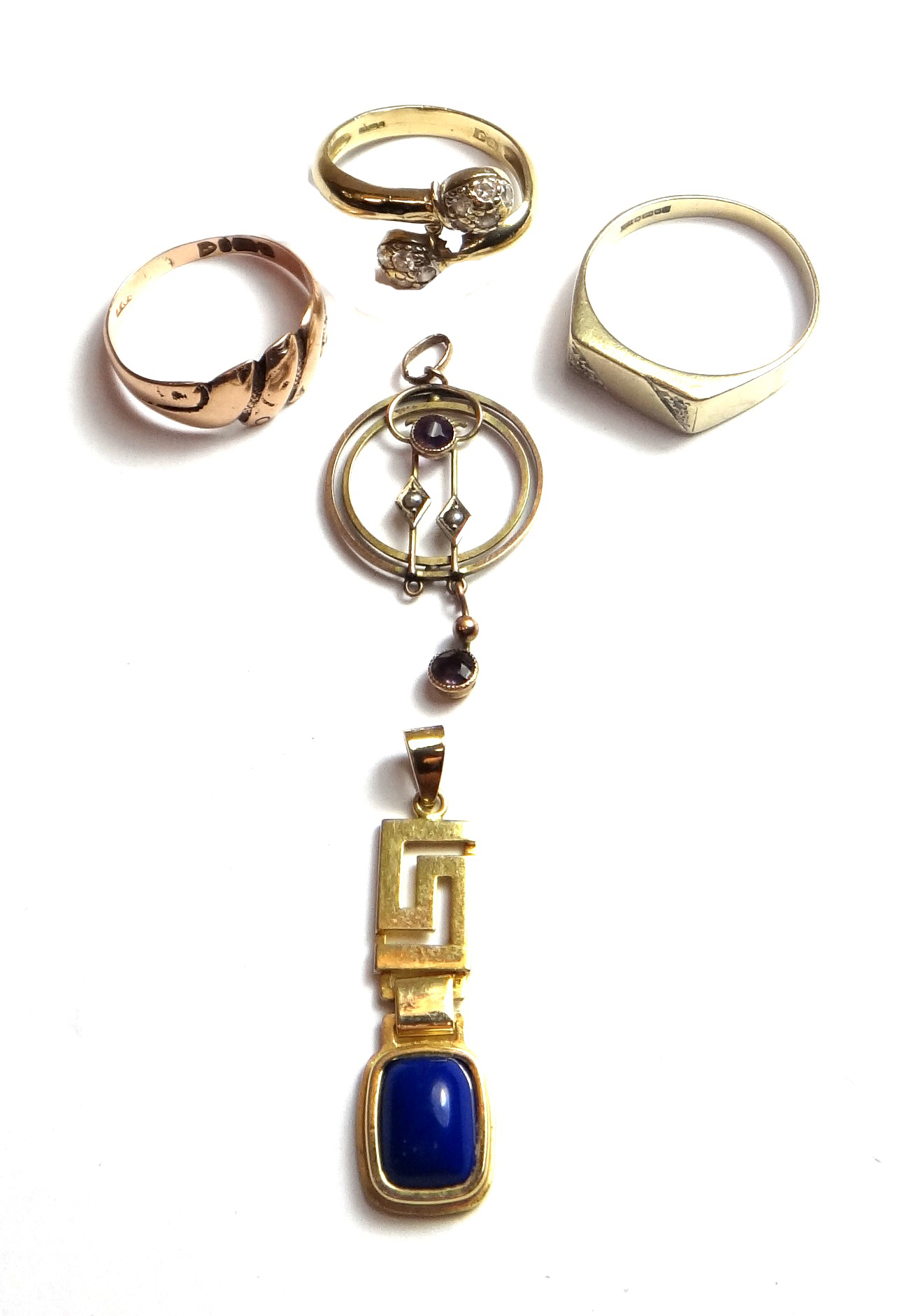 A gold, amethyst and seed pearl set circular pendant, detailed 9 CT, a gold and blue gem set