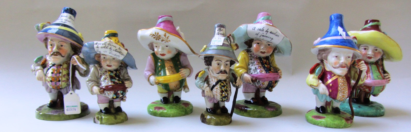 Seven Samson Derby-style Mansion House Dwarves, late 19th century, iron red, puce or gilt marks,