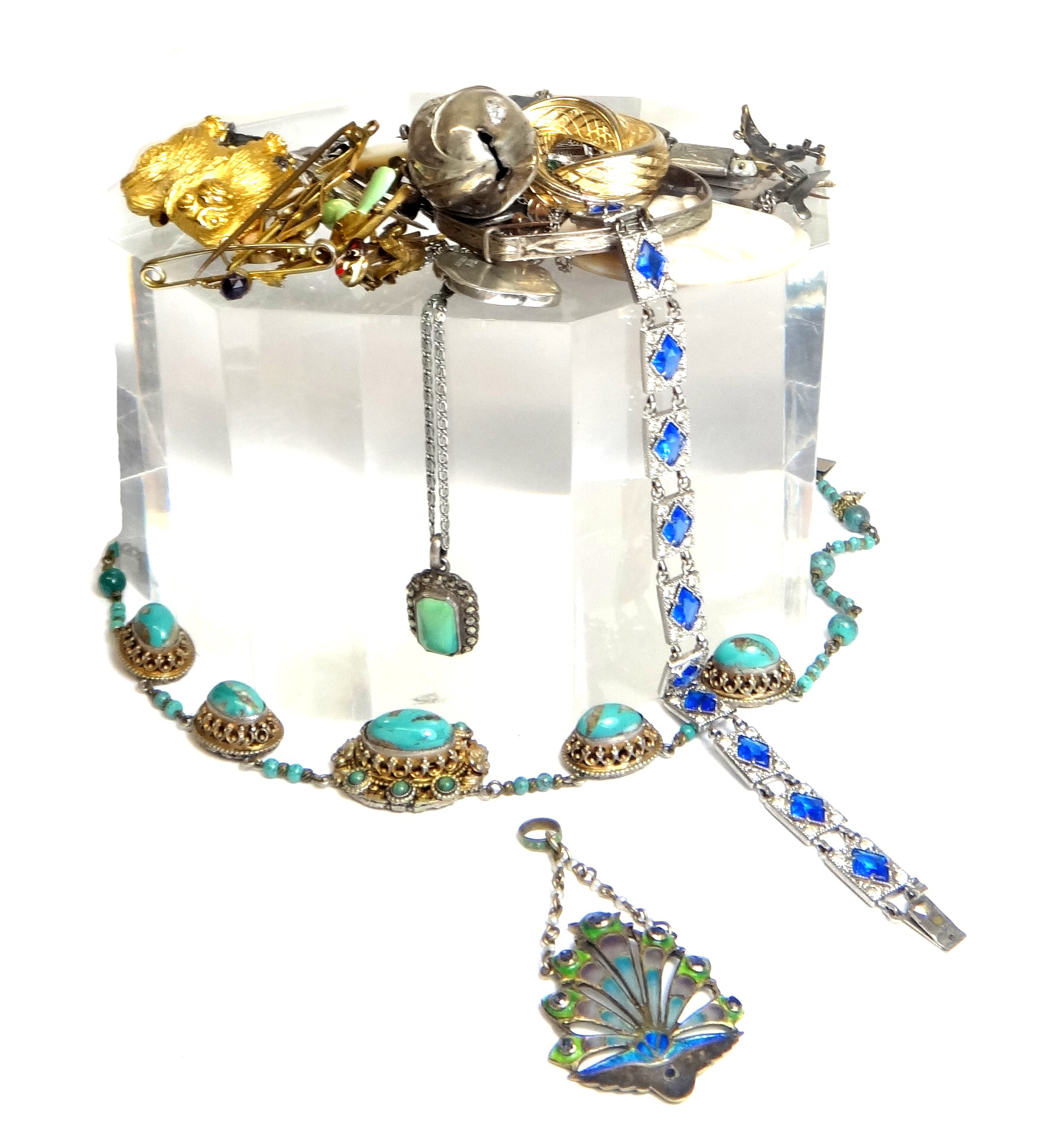 A group of mostly jewellery, comprising; fifteen brooches and pins, two bracelets, a silver