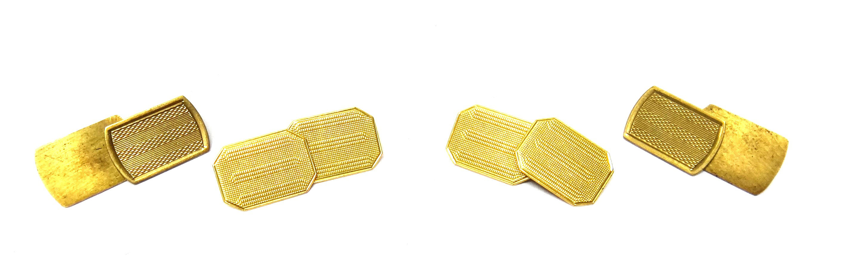 A pair of 18ct gold cut cornered rectangular cufflinks, with engine turned decoration, Birmingham