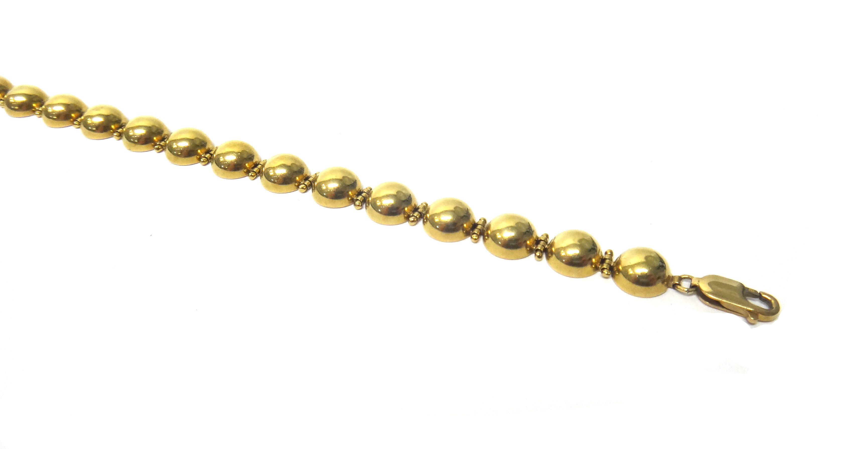 A gold bracelet, in a hemispherical link design, detailed 375, on a sprung hook shaped clasp,