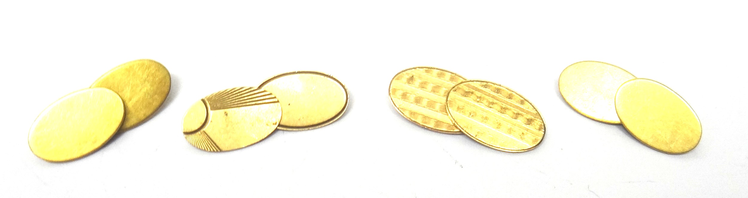 A pair of 18ct gold plain oval cufflinks, London 1949, weight 10.5 gms and two odd 9ct gold oval