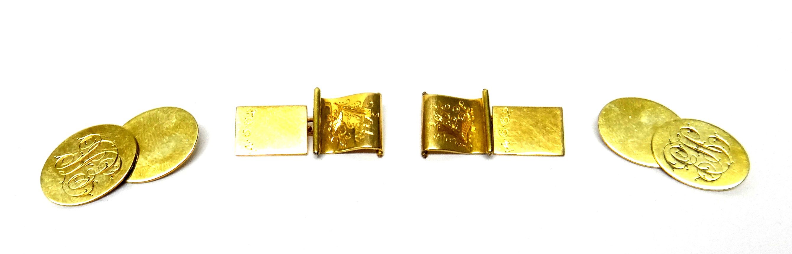 A pair of 9ct gold oval cufflinks, each monogram engraved to one side, Birmingham 1928, weight 7.5