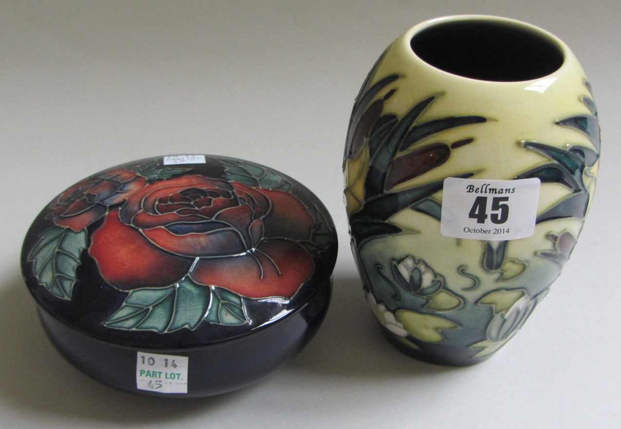 A Moorcroft pottery vase, decorated in the 'Bullrush' pattern, against a yellow ground, dated