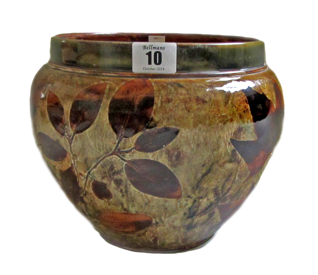 A Royal Doulton saltglaze stoneware jardiniere decorated in the 'Autumn Leaves' pattern, impressed