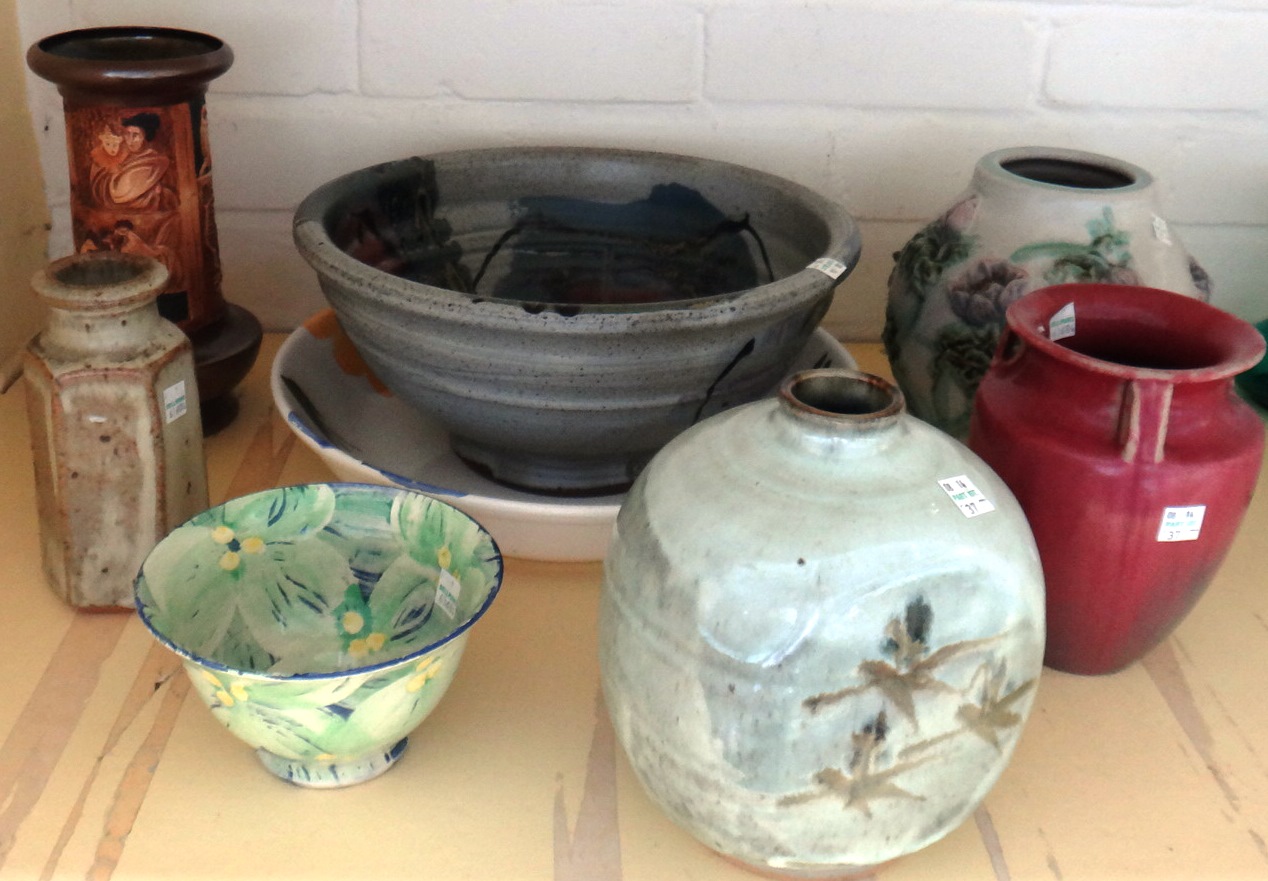 A quantity of studio pottery, including; a 1950's tall vase with circular geometric decoration (54cm