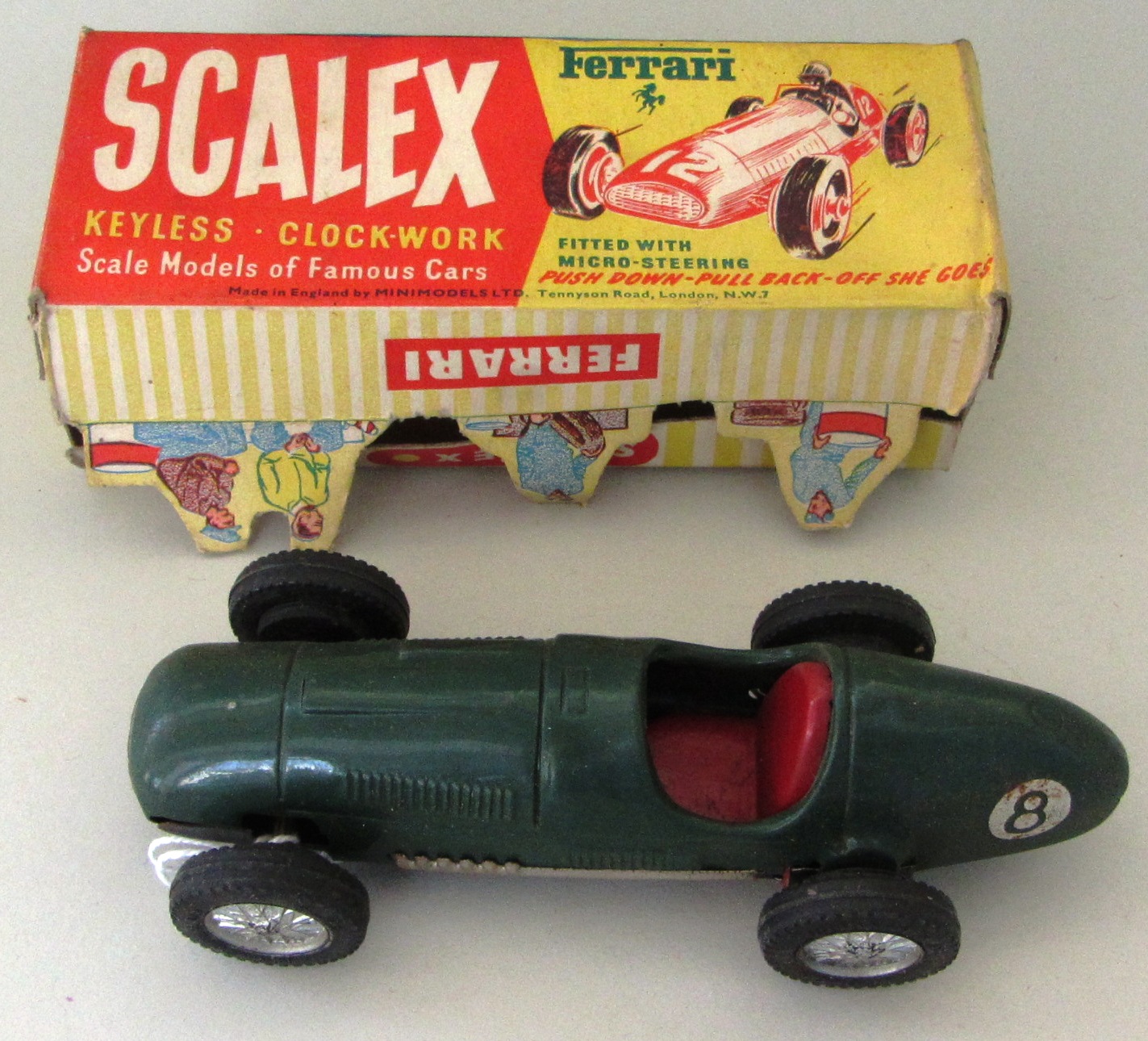 A Scalex keyless clockwork Ferrari car, boxed (a.f).