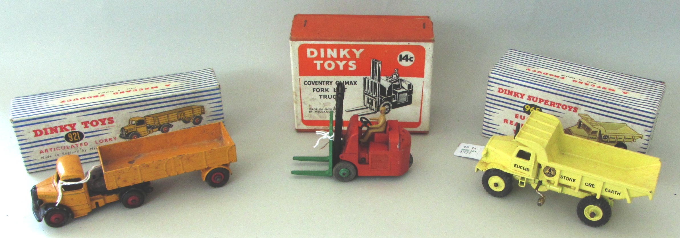 A Dinky 921 Articulated lorry, yellow livery, boxed, a Dinky 965 Euclid Rear dump truck, boxed,