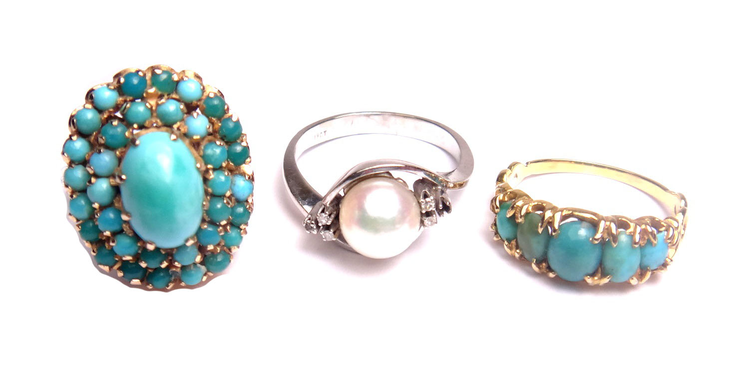 A gold and turquoise set five stone ring, a white gold ring, mounted with a cultured pearl,