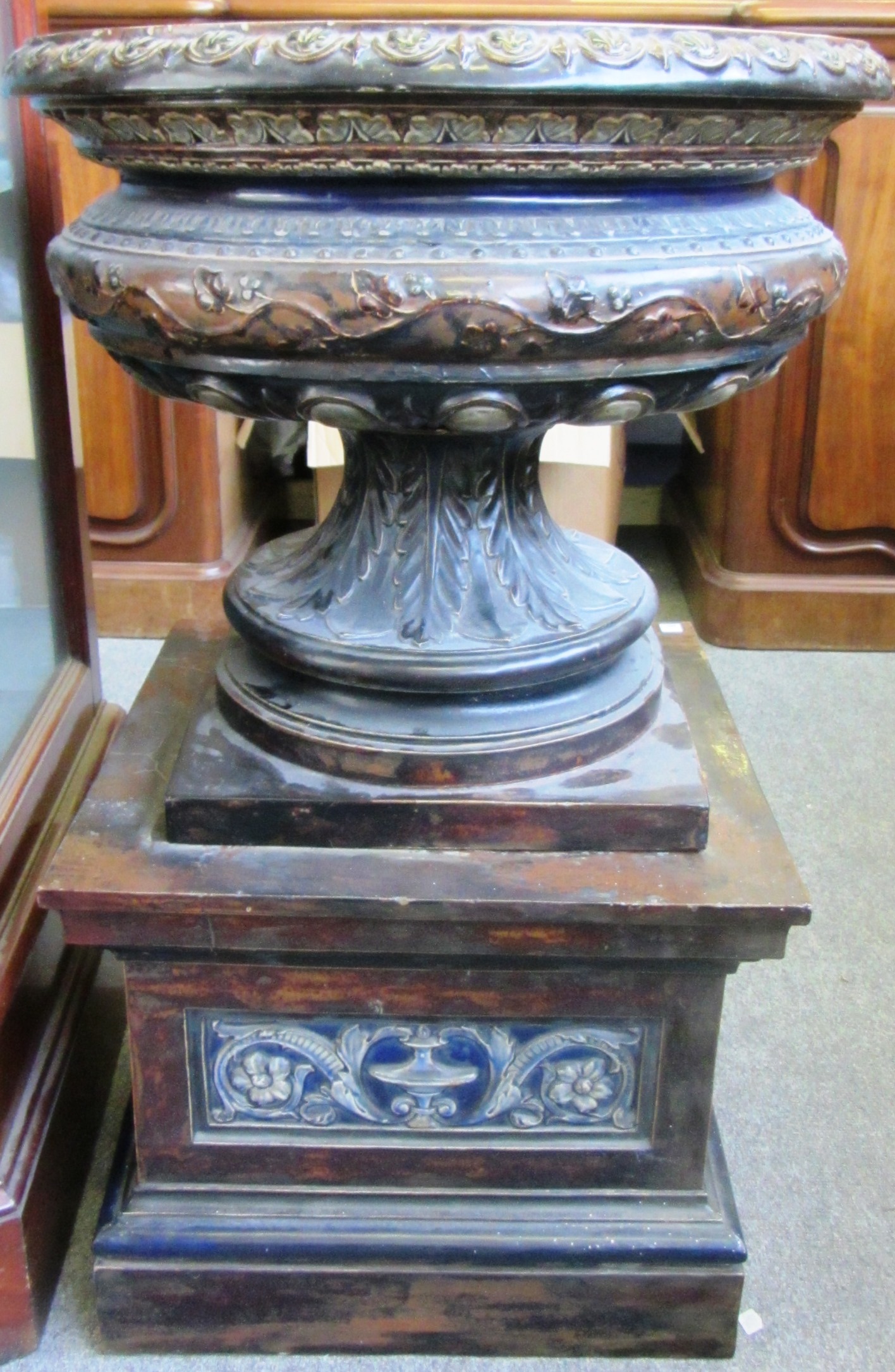 A Large Doulton Lambeth saltglaze stoneware urn on stand, late 19th century, acanthus leaf moulded