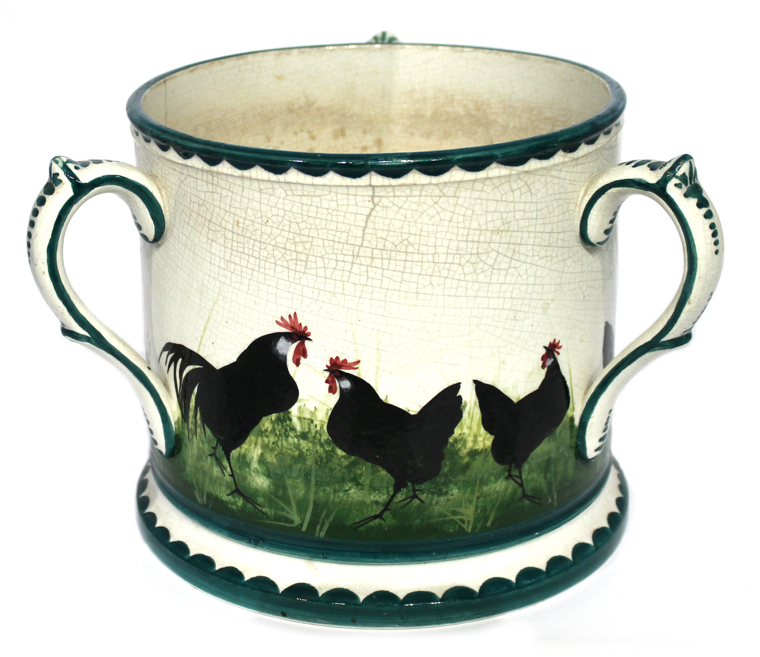 A Wemyss ware pottery tyg, c.1900, decorated with a band of hens, retailed by T G Goode and Co., (