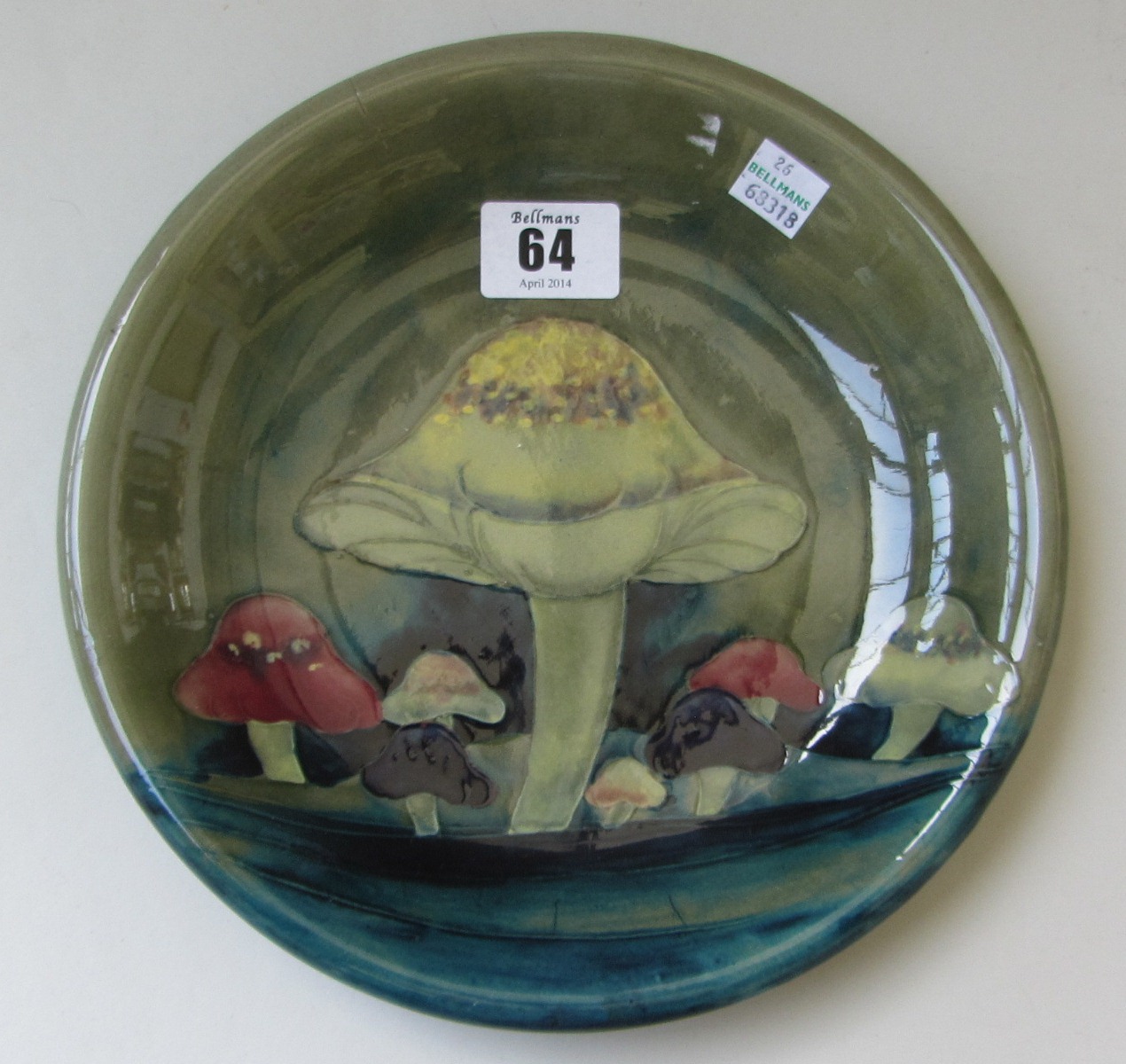 A Moorcroft shallow bowl decorated in the Claremont toadstool pattern, circa 1907, painted and