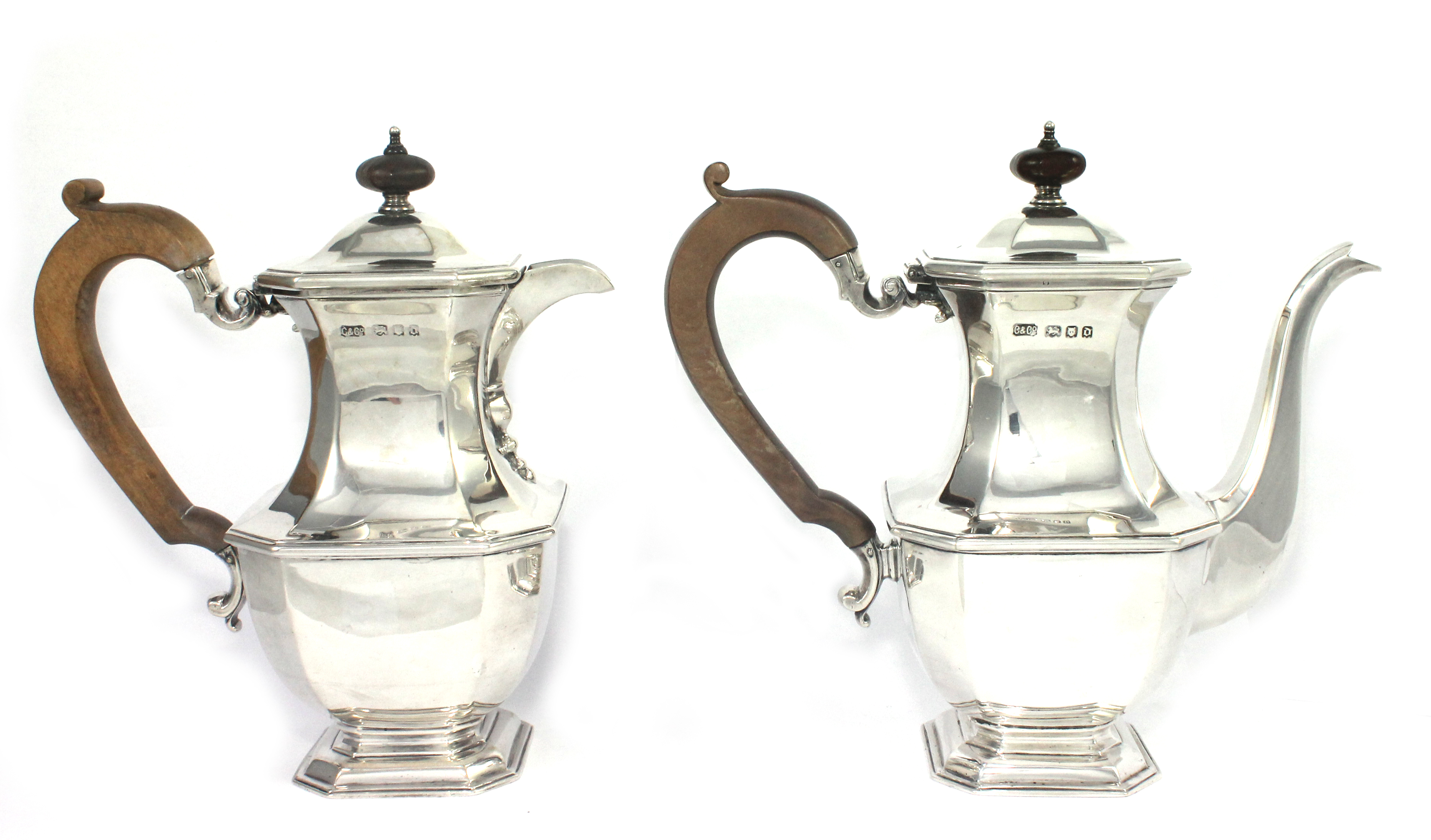 A silver two piece cafe au lait set, each piece of geometric form in the 18th century taste, with