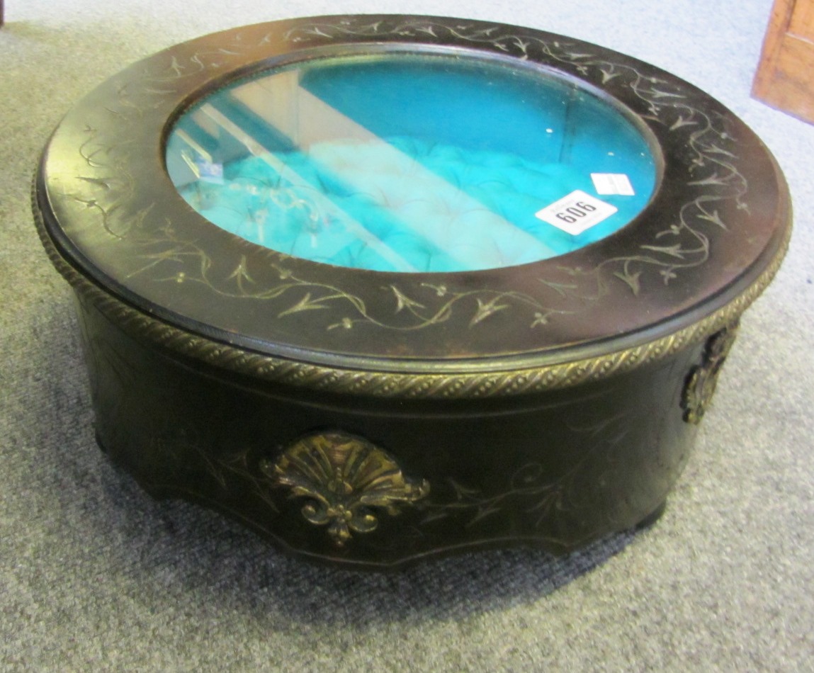 A 19th century gilt metal mounted ebonised circular table top vertu case of circular form, 36cm