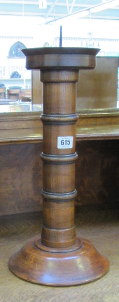 A pair of large turned hardwood pricket candlesticks, 48cm high.
