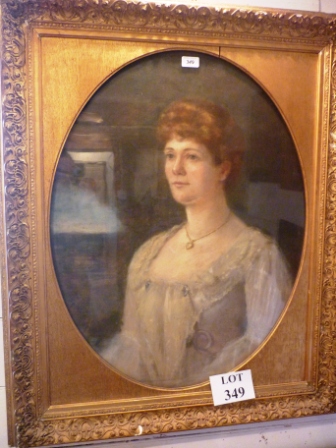 A late 19c/20th century gilt framed and glazed pastel portrait study of a pretty lady (2' 6" x 23"