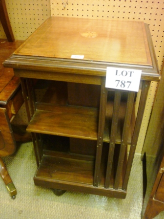 An Edwardian inlaid revolving bookcase est: £80-£120