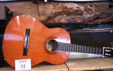 A Spanish guitar est: £30-£50 (AB11)