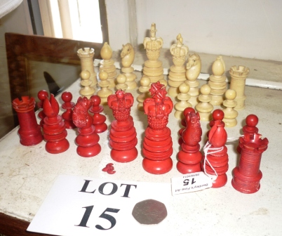 A red and neutral carved ivory chess set (some pieces a/f) est: £200-£400 (N2)