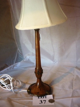 A 19th century French turned wood and bras table lamp in the neoclassical taste est: £30-£50 (G1)