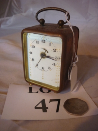 An Italian carriage copper cased clock by Veglia' est: £30-£50 (N1)