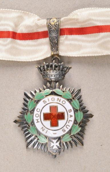 Spain  Order of merit of the red cross.  Silver gilded, partly enameled, on a flexible crown, long