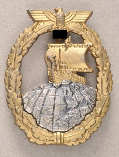 Germany (1933-1945)  Auxillary Cruiser War Badge.  Zinc gilded, the globe in silvered brass and