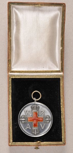 Prussia  Red-Cross-Medal, 2. class, in box.  Silver, partially enamelled and chiseled; in red