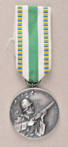 War Veteran Associations  Saxony: Veterans-Association-Merit-Medal, in silver.  Silvered, on ribbon.