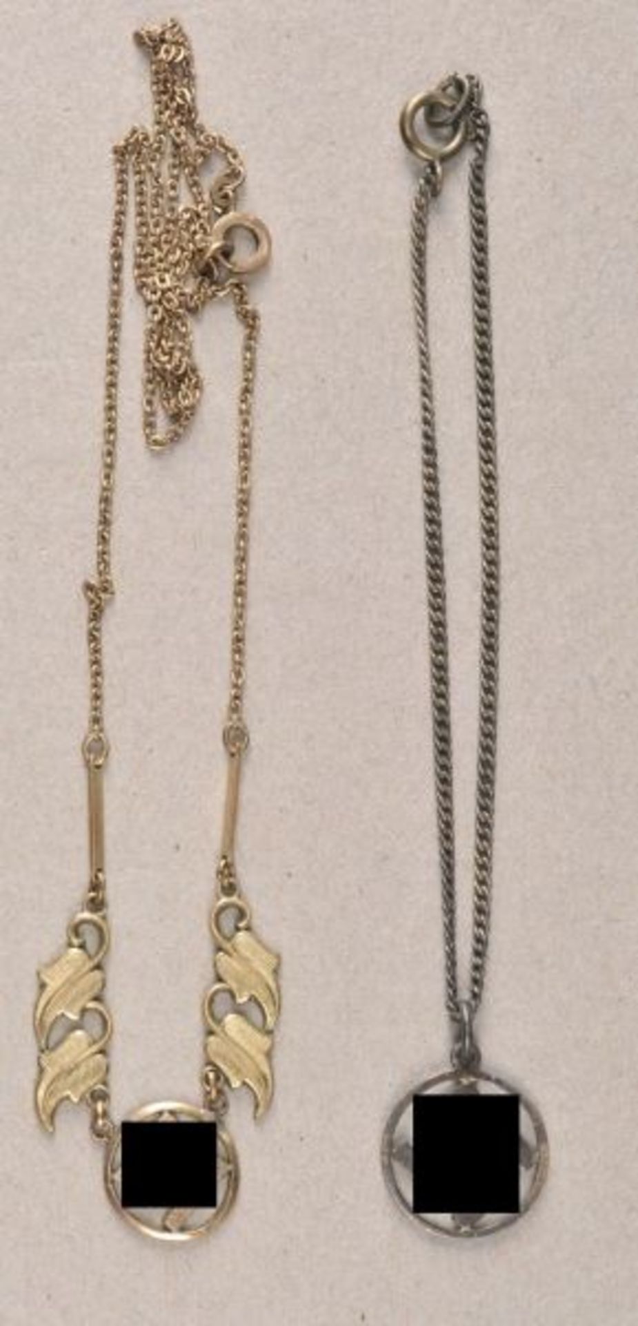 Germany (1933-1945)  Lot of 2 pieces of Swastika jewellery.  Different.  Condition: II    Starting