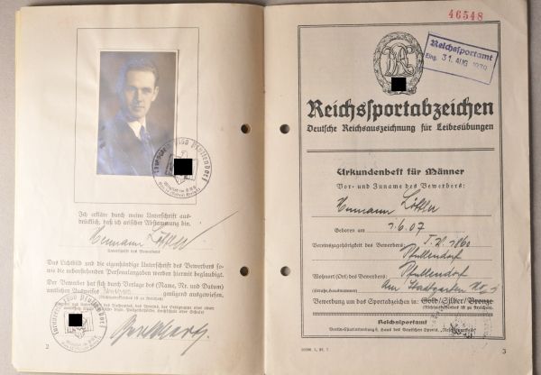 Germany (1933-1945)  Badge for sports, silver, awarding book.  Awarding on 11.9.1939 to Hermann