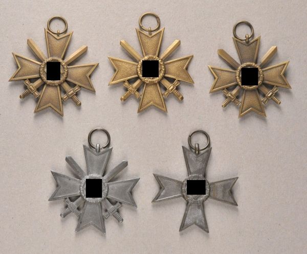 Germany (1933-1945)  Lot of 5 war merit crosses, 2nd class.  With or without swords, non-ferrous