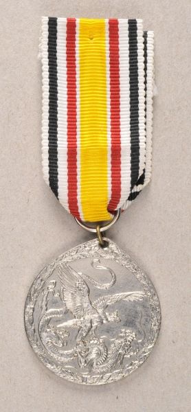 German Empire (1871-1918)  China votive medal in steel for non-combatant.  silvered, on ribbon.