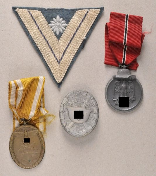 Germany (1933-1945)  Property of a lance corporal.  1.) wounded stripe, 1939, gold; 2.) medal east