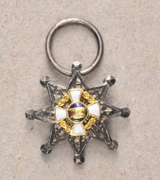 Italy  Order of the italien crown, miniature.  Silver, partly enameled, on a ring.  Condition: II