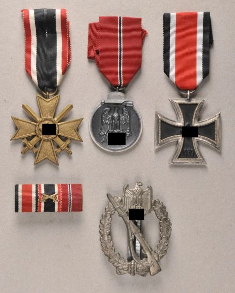 Germany (1933-1945)  Property of an infantryman with 4 decorations.  Sundry, mostly on a ribbon.